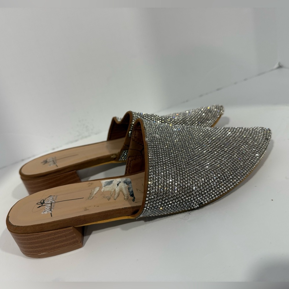 Bisou Bisou Michele Bohbot pointed-toe mules in silver rhinestone.